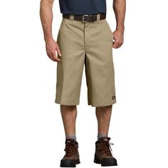 PRICES MAY VARY. CLASSIC WORKWEAR: This comfortable short sports an extra-long 15" inseam hemmed to hit below the knee. It's made of durable poly-cotton twill that resists wrinkles & spills & features our signature tunnel belt loops & 2-piece waistband to prevent rolling STURDY FUNCTIONALITY: This loose-fit short is designed with a slenderizing flat front, extra multi-use pocket on the right leg, slant hand pockets & welt back pockets for a smooth contoured look, plus a permanent leg crease & zi Dickies Clothing, Army Navy Store, Workwear Brands, Safety Clothing, Work Uniforms, Work Shorts, Mens Khakis, Lifestyle Clothing, Sport Shorts