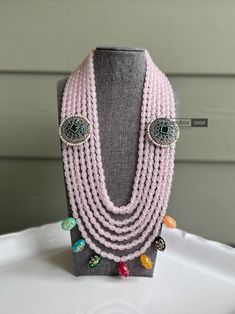 Elevate your style with our stunning Pink Layered Indian German Silver Necklace. Handcrafted with exquisite attention to detail, this piece blends traditional Indian design with modern elegance, making it the perfect statement accessory for any occasion.  Featuring intricate tanjore beads that add a touch of authentic charm, this necklace is crafted from high-quality brass, ensuring durability and a timeless appeal. Embrace the spirit of Diwali and Indian heritage with this exquisite piece that effortlessly combines ethnic allure with contemporary flair.  Add a touch of opulence to your ensemble with this gorgeous Indian jewelry, perfect for both formal and casual wear. Stand out from the crowd and indulge in the rich cultural tapestry of India with our unique, handcrafted Pink Layered Ind Diwali Party Chandbali Necklaces, Bohemian Kundan Chandbali Necklace With Cutdana, Bohemian Necklaces With Stone Work For Diwali, Elegant Kundan Necklace For Festivals, Bohemian Bridal Necklace With Cutdana For Diwali, Bohemian Stone Work Necklaces For Festivals, Bohemian Jewelry With Stone Work And Round Beads, Bohemian Jewelry With Stone Work Beads, Bohemian Chandbali Necklaces For Wedding