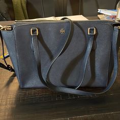 His Adorable Tory Burch Satchel Will Be The Perfect Everyday Bag. Brand - Tory Burch Color - Navy Blue With Gold Hardware Condition - Used Twice, Like New Tory Burch Fleming, Tory Burch Robinson, Barrel Bag, Convertible Bags, Black Leather Tote, Zip Tote, Tory Burch Bags, Monogrammed Leather, Tory Burch Bag