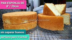 two pieces of cake sitting on top of a cooling rack next to each other with the words pan espona de 8 / 7cm