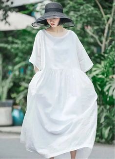 Chic and Comfortable White Linen Summer Dress Step into effortless style and comfort with our Women Summer White Linen Daily Robe Dress. Crafted from high-quality linen, this dress is a must-have for your summer wardrobe. Key Features: Color: Crisp White Size: One Size Fits Most Sleeve Length: 3/4 Sleeves Skirt Length: Long, for a graceful look Collar Type: Round Neck for a classic touch Silhouette: Type A, flattering for all body types Pattern: Solid, timeless elegance Clothes Placket: Pullover Plain Linen Summer Dress, Oversized White Linen Casual Dress, White Summer Dress With 3/4 Sleeve, Oversized White Midi Dress For Spring, Casual Oversized White Linen Dress, Casual Linen Dress With Half Sleeves For Spring, Casual Half Sleeve Linen Dress For Spring, Summer Midi Dress With Half Sleeves And Relaxed Fit, Relaxed Fit 3/4 Sleeve Midi Dress For Summer