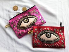 Evil Eye Coin Purse, Evil Eye Zipper Wallet, Ethnic Bag, Handmade Coin Pouch, Make Up Bag, Clutch Bags for Women, Makeup Red Pink Eye Bag These beautiful bags can be used for your make up products, for your coins, credit cards, cash, stationary. It is up to you :) Both pink and red colors are available. Color of the inside of the purse is black. Evil Eye Coin Purse dimensions are 4 x 6 inches (approximately 10 cm x 16 cm). It is easy to use with the zipper. Evil eye is an old belief that helps t Traditional Red Pouch For Everyday Use, Red Rectangular Pouch For Festivals, Bohemian Pouch Coin Purse As Gift, Traditional Handmade Red Pouch, Red Handmade Traditional Pouch, Pink Evil Eye Pattern, Pink Bohemian Jewelry With Evil Eye Detail, Handmade Red Pouch Wallets, Pink Evil Eye Crochet