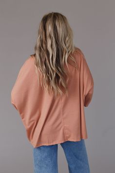 With such a perfect boho silhouette, the Cozy Cool Oversized Tee is a closet staple! It's a must - have because: Soft, comfortable fabric with a nice stretch Classic crew neckline Dropped shoulders with 3/4 length sleeves Oversized, boxy silhouette Pairs perfectly with: Eye Of The Sun Padded Bralette, So Comfy Wide Leg Pants, Feeling Fierce Layered Necklace *Due to lighting and differences in monitors, actual colors may vary slightly from what appears online. Model is 5'8" and wearing a size Small. Approximate measurements are as follows: SMALL: Bust: 66", Length: 26.5", Sleeve length: 9" MEDIUM: Bust: 68", Length: 28.5", Sleeve length: 10" LARGE: Bust: 70", Length: 30.5", Sleeve length: 11" X - LARGE: Bust: 72", Length: 32.5", Sleeve length: 12" 96% Polyester, 4% Spandex Hand wash cold, L Boho Silhouette, Oversized Tee Shirt, Three Bird Nest, Padded Bralette, The Nest, Closet Staples, Bird Nest, Layered Necklace, Oversized Tee