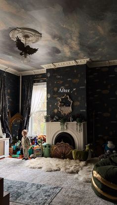 a living room filled with furniture and a fire place under a painting on the ceiling