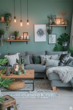 a living room filled with lots of furniture and plants on the wall above it's coffee table