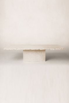 a white rectangular object sitting on top of a table