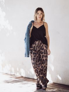 A perfectly printed pair for your pajama-inspired wardrobe, these satin pants are perfect for lounging during a night in or elevating for your night out. Easy with a simple tee or elevated with heels and a blazer, this pair will turn heads with every wear. Leopard Pants, Satin Pants, Free People Clothing, Simple Tees, Night In, Pajamas