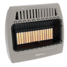 an electric heater sitting on top of a white table