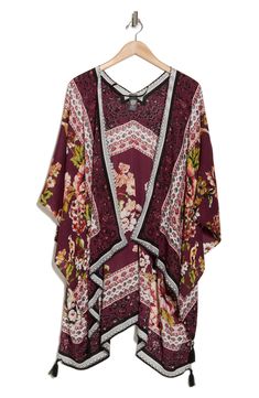 Love to layer this lightweight ruana that is covered in a garden bird design that is perfect for your next warm-weather adventure. 36" length (size O/S) Open front Short sleeves 100% rayon Hand wash, dry flat Imported Floral Print Outerwear For Beach In Fall, Floral Print Outerwear For Fall Beach Outing, Vacation Floral Print Open Front Outerwear, Bohemian Outerwear With Floral Print And Kimono Sleeves, Bohemian Outerwear With Floral Print For Beach, Floral Print Open Front Outerwear For Vacation, Open Front Floral Print Outerwear For Vacation, Bohemian Floral Print Outerwear For Beach, Vacation Open Front Floral Outerwear