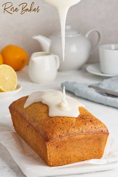 a piece of cake with icing being drizzled over it