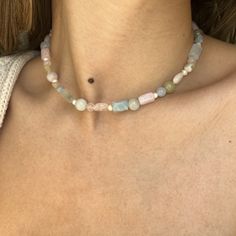 "Embrace sophistication with our \"Pastel Color Gemstone Necklace,\" adorned with Pink Quartz, Aquamarine, Morganite, Aventurine, and lustrous pearls. This exquisite piece showcases a stunning fusion of soft colors, making it the perfect accessory for any occasion. Whether it's a formal event or a casual outing, this pastel color choker radiates elegance and charm. Treat yourself or surprise a loved one with this timeless and versatile necklace, designed to elevate your style and capture hearts with its enchanting beauty. ● Gemstones: Pink Quartz, Aquamarine, Morganite, Aventurine and Pearl ● Care Instructions: To maintain the beauty of this handcrafted necklace, handle it with care and store it away from direct sunlight, chemicals, and moisture. Avoid contact with perfumes or lotions. Whe Pearl And Gemstone Necklace, Pink Pearl Necklace With Gemstone Beads, Elegant Pink Pearl Gemstone Necklace, Luxury Pink Pearl Necklace With Gemstone, Pink Rose Quartz Gemstone Beaded Necklace, Pink Rose Quartz Gemstone Necklaces, Handcrafted Necklace, Pearl Choker, Pink Quartz