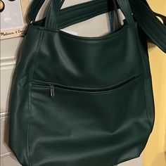 Color: Dark Green Pattern: 3in1 Bag Size: Large Size Width: 28-32 Cm + 8 Cm Sides And Bottom/ 11- 12,5 In + 3 In Sides And Bottom Height: 40 Cm / 15, 5 In Adjustable Crossbody Strap: 65-125 Cm / 25,5-49 In It Holds The Format A4 - Done Very Carefully, - Aesthetic Finish, - Fastened With Zipper, - Long Adjustable Strap (65- 125 Cm/25,5 -49 In), - Handles: 40 Cm/ 15,5 In, - Inside Cotton Lining With Three Pockets, One Of Them Fastened With A Zipper, - Front Deep, Practical, Pocket Fastened With A Green Faux Leather Satchel For Travel, Green Faux Leather Travel Shoulder Bag, Green Faux Leather Shoulder Bag For Errands, Green Faux Leather Bag For Errands, Green Faux Leather Travel Satchel, Green Faux Leather Bag For Everyday Use, Green Bucket Bag With Zipper For Everyday Use, Green Bucket Bag With Zipper Closure For Everyday Use, Everyday Faux Leather Bucket Bag With Detachable Handle