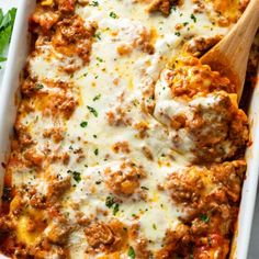 a casserole dish with meat, cheese and parmesan sauce in it