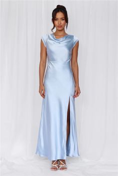 Length from shoulder to hem of size S: 143cm.  Chest: 39cm, Waist: 34cm, across front only of size S.  Maxi dress.  Lined.  Model is a standard XS and is wearing size XS.  True to size.  Non-stretch.  Luxurious satin.  High cowl neckline.  Cap sleeve.  Tie to back.  Twist back with cutout.  Split to skirt.  Straight, flowy silhouette.  Zipper with hook eye closure.  Cold hand wash only.  Polyester.   This material is very delicate. Please handle with care.    Please Note: This product is a Hello Molly Exclusive.    Step into a world of enchantment with Hello Molly's newest bridesmaid collection, Wedding Parlour.  Introducing a captivating style, designed with a high cowl neckline and delicate cap sleeves, evoking timeless elegance and femininity. The tie-back feature adds a charming touch, Light Blue Wedding Guest Dress, Candy Dress, Skirt Straight, Prom Shopping, Purple Mini Dresses, Maxi Dress Wedding, Lace Neckline, Blue Bridesmaids, Satin Maxi