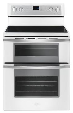 two white double ovens side by side