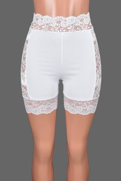 *Free USA shipping! *Handmade after you order: check order processing times These stretchy high-waisted white shorts have a scalloped lace waistband and sheer lace sides. Wear them under skirts, dresses, or shorts for extra leg coverage. ♦LENGTH: 5 inch inseam will reach to your mid to upper thigh ♦FABRIC TYPE: Main fabric is soft and stretchy 90% cotton, 10% spandex medium weight jersey knit. Lace fabric is 90% poly, 10% spandex and lace trim is nylon. ♦WASHING INSTRUCTIONS: hand wash cold or m Fitted Bottoms With Contrast Lace For Summer, Fitted White Bottoms With Lace Patchwork, Lace Trim Lace Shorts, White Lace Bottoms With Lace Trim, Stretch Bottoms With Contrast Lace For Summer, Summer Bottoms With Stretch And Contrast Lace, Summer Bottoms With Contrast Lace And Stretch, White Stretch Bottoms With Contrast Lace, Fitted Lace Shorts With Lace Trim