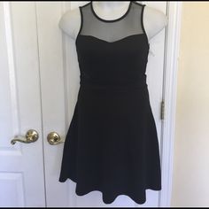 You Will Be The Center Of Attraction In This Black Sleeveless Dress By Kandy Kiss. Featuring Round Neck, Tulle On The Neck, And Both Sides Of The Front Waist, Sexy Yet With Class. Sleeveless, Fit And Flare And Zipper At The Back For Easy Wear. Body: 95% Polyester 5% Spandex Contrast: 100% Polyester Machine Wash Black 6 35” Shoulder To Hem 15” Armpit Laying Flat 13” Waist Laying Flat Kiss Dress, Kandy, Black Sleeveless Dress, Size 6 Dress, Black Sleeveless, Easy Wear, Fit And Flare, Sleeveless Dress, Little Black Dress