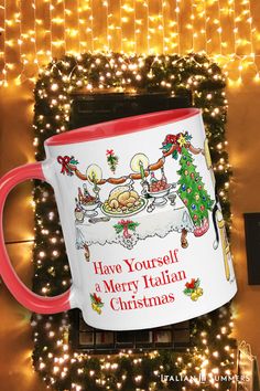 a large coffee mug sitting on top of a christmas tree