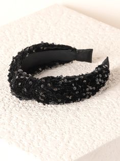 Complete your look this holiday season with Shiraleah's Knotted Sequins Headband. This headband will add a chic and elevated touch to your outfit. This one-size headband features a sequin pattern on lustrous fabric, making it a chic and elevated touch to add to any outfit. Made from polyester and adorned with a knotted detail, this headband will keep your hair at bay while amplifying your style. Color: Black One Size Polyester Made In China Vegan 12-Bw-095Blk Indie Lee, Knotted Top, Sequin Pattern, Headband Black, Summer Skin, Headband Styles, Fabric Making, Moisturize Hair, Summer Clothing