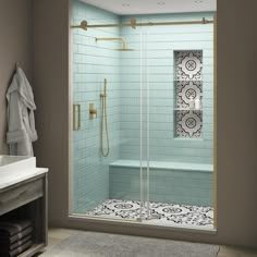 a bathroom with a walk in shower next to a sink