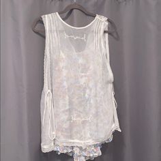 Free People Fancy Tank Top Blouse. Floral Shirt Underneath A Sheer Top. The Sides Tie And Are Flown With Openings. Never Worn Before. Size Xs. Summer Floral Print Blouse For Loungewear, Floral Print Summer Blouse For Loungewear, Summer Tops With Lace Trim For Daywear, Summer Lace Trim Tops For Daywear, Sheer Sleeveless Blouse For Spring, Feminine Sheer Tops For Daywear, Vintage Sleeveless Tops For Loungewear, Summer Lace Trim Loungewear Top, Summer Lace Trim Top For Loungewear