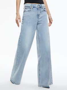 Trish Mid Rise Baggy Jean In Rockstar Blue | Alice And Olivia Chic Baggy Flare Jeans, Chic Wide Leg Faded Jeans, Chic Faded Wide Leg Bottoms, Chic Baggy Mid-rise Flare Jeans, Chic Wide Leg Faded Bottoms, Chic Baggy Mid-rise Jeans, Chic Baggy High Rise Jeans, Chic Faded Straight Leg Jeans, Trendy Light Wash Wide-leg Jeans