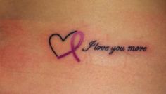 a woman's stomach with a tattoo that says, i love you more