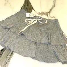 This Is A Gray Super Soft Sweatshirt Fabric Skirt With A Working Drawstring, Size Xs. It Can Fit A Size S Too.. Express Tends To Run Slightly Large. It Has Two Flounces As Layers That Makes It So Feminine And Cute. Great Skirt! Has Tag Attached. Waist Lying Flat Is 13” Length Lying Flat Is 14” Skirt Bin Skirts Cute, Accessory Inspo, Fabric Skirt, Sublimation Ideas, Pretty Skirts, Chiffon Fashion, Black Leather Skirts, Sweatshirt Fabric, Red Skirts