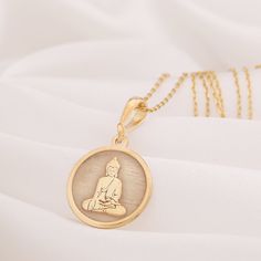 14K Solid Gold Buddha Necklace, Zen Jewelery, Spiritual Necklace, Buddha Pendant, Buddhism Inspired, Enlightenment, Silver Buddha Necklace * Gender : Male / Female * If you prefer a 14k solid gold, we will send a 50cm 14 carat gold chain weighing 1-1.5 grams. * If you prefer a Silver necklace, we will send you a 50cm silver chain.  * If you prefer a 14k solid gold with triple chains, we will send you the lengths of 37/45/50cm as in one as triple that are presented in the models.  * If you prefer Spiritual Yellow Gold Round Charm Necklaces, Spiritual Yellow Gold Round Charm Necklace, Spiritual Round Necklace, Cadmium-free, Spiritual Yellow Gold Necklace Cadmium-free, Spiritual Cadmium-free Round Pendant Necklace, Gold Round Necklace For Meditation, Gold Buddha, Spiritual Necklace, Buddha Necklace