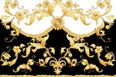 an ornate gold and black background with flowers