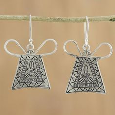 Paying homage to the silver artistry of the Hmong hill tribes of Thailand artisan Chanatip Na Lampoon crafts these lovely earrings inspired by a Hmong lock design. Geometric designs are engraved by hand in the high-quality Thai silver..950 Silver Clay Christmas Decorations, Lock Design, Design Geometric, Silver Dangle Earrings, Lovely Earrings, Silver Earrings Dangle, Geometric Designs, Hook Earrings