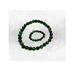 This Natural Green Tiger Eye set includes a bracelet and ring, both made with 8mm beads. The bracelet and ring are crafted from natural Green Tiger Eye, which offers a unique and stunning appearance. Experience the beauty and benefits of this one-of-a-kind set. Handmade Green Malachite Bracelets, Green Malachite Bracelets With Natural Stones, Green Malachite Beaded Bracelets As Gift, Green Malachite Beaded Bracelets, Green Malachite Beaded Bracelet As Gift, Green Malachite Bracelet With Natural Stones, Malachite Jewelry With 8mm Round Beads, Green Malachite Bracelets For Gifts, Green Malachite Round Bracelets