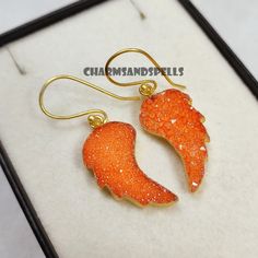 Sugar Druzy Angel Wing Earring, Dangle Earring, Gemstone Earring, Vintage Look Earring, Handmade Earrings, Unique Gift For Her, Gift Idea Handmade Jewelry Gemstone- Sugar Druzy Color- Orange Style- Electroplated Metal - Brass Plating- Gold Theme- Love And Friendship Contact Us If You Have Any Query, Feel free for Catalogue, Samples & Bulk Price list. We do Deal In Bulk Quantity. Contact Us In Message For Bulk Order And Get An Amazing Discount. Explore a world of exquisite designs - simply follow Orange Style, Earring Dangle, Angel Wing Earrings, Gold Theme, Earring Handmade, Wing Earrings, Earrings Unique, Unique Gifts For Her, Orange Fashion