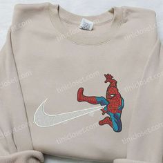 Spider-Man x Nike Swoosh Embroidered Sweatshirt, Nike Inspired Embroidered Shirt, Best Gifts for Family Casual Streetwear Tops With Machine Embroidery, Casual Tops With Machine Embroidery For Streetwear, Casual Machine Embroidered Tops For Streetwear, Long Sleeve Tops With Machine Embroidery For Streetwear, Sporty Crew Neck Sweatshirt With Machine Embroidery, Sporty Cotton Sweatshirt With Machine Embroidery, Casual Crew Top With Machine Embroidery, Sporty Cotton Tops With Machine Embroidery, Nike Inspired