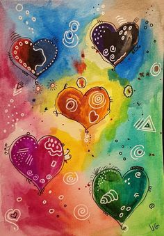 an art project with hearts painted on watercolor paper