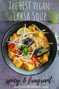 the best vegan laksa soup in a black bowl