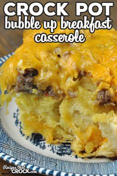 crock pot bubble up breakfast casserole on a blue and white plate with text overlay