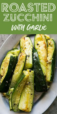 roasted zucchini with garlic on a white plate