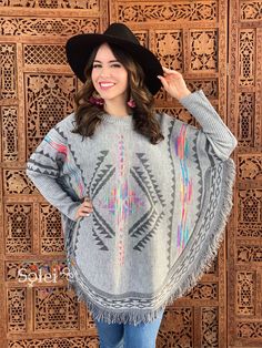 This gorgeous Mexican Artisanal Poncho is perfect for the cold months ahead! The unique design adds that perfect pop of color and style to your wardrobe. This poncho is knit, has open sides and it comes in one size so anyone ranging from size Small to 2x will be able to wear it. Note: -The Mexican Hat and Filigree Earrings are available to buy as well. Filigree Earrings: https://www.etsy.com/es/listing/872645794/aretes-mexicanos-de-filigrana-aretes?ref=listings_manager_grid Winter Long Sleeve Festival Cape, Multicolor Long Sleeve Cape For Winter, Multicolor Long-sleeved Winter Cape, Multicolor Long Sleeve Cape For Fall, Multicolor Long Sleeve Winter Cape, Winter Festival Poncho, One Size, Winter Festival Poncho One Size, Multicolor Cape Poncho For Winter, Multicolor Winter Cape Poncho