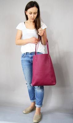 "Leather tote bag, Leather tote, Tote bag leather, Tote bag, Leather tote woman, Leather tote - MADRID SIMPLE LEATHER TOTE BAG Dimensions: Height: 15.5'' 39 cm Width: 12.2'' 31 cm Handles: 23.6'' 60 cm Handle drop: 10.2\" 26 cm Casual and simple tote bag made from high quality pebbled leather. It is slim, lightweight, strong and fits comfortably over the shoulder. * Highest quality Italian leather * Includes interior zipped pocket and key chain * Gold zipper & hardware * Fits a laptop (up to Large Bags For Errands, Pink Tote Bucket Bag For Everyday, Simple Tote Bag, Simple Tote, Magenta Purple, Simple Leather, Sewing Leather, Coin Wallet, Purple Leather