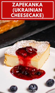 a piece of cheesecake on a plate with blueberries