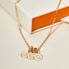 An imprint on your heart and on your jewelry, our Personalized Letter Pendant Necklace is the perfect way to treasure the love of your little ones. Choose up to 5 letter pendants to represent your children's initials, hand-engraved with their names or date of birth on the reverse.18K Champagne Gold Plated or 925 Sterling SilverLetter charm: 0.3Secure clasp fasteningCharms are removable from this chain and can be worn on all Merci Maman chain lengthsHand-engraved in our Paris WorkshopSent with lo Initial Pendant Charm Necklaces For Anniversary, Initial Pendant Charm Necklaces As Anniversary Gift, Name Initial Pendant Charm Necklace For Anniversary, Initial Pendant Charm Necklace For Anniversary Gift, Personalized Initial Pendant Charm Necklace For Anniversary, Anniversary Gift Initial Pendant Charm Necklaces, Dainty Engraved Charms For Gift, Dainty Engraved Charms As Gifts, Initial Pendant Charm Necklace For Anniversary