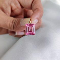 This stunning pendant is set in 14K Solid Yellow Gold with Pink Sapphire Hydro in classic prong setting. It is an unique gemstone pendant for nearly every occasion and is completely hassle-free jewelry. ◾ITEM DETAILS * Gem: Pink Sapphire Hydro * Gem Size: 10X12mm * Gem Shape: Octagon cut * Gem Weight: 7.60 carats * Gold Purity: 14KT  * Gold Weight: 0.97gram * Total Weight of the Pendant: 2.49 gram The Gold purity is guaranteed and it comes with authentic 14KT gold hallmark. Since my items are ha Handmade Jewelry Box, Unique Gemstones, Sapphire Jewelry, 14kt Gold, Pink Sapphire, Free Jewelry, Gemstone Pendant, Prong Setting, Jewelry Box