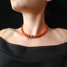 Orange Red Coral Necklace With Round Beads, Orange Gemstone Beads Necklace In Red Coral, Orange Red Coral Gemstone Beaded Necklaces, Orange Red Coral Gemstone Beaded Necklace, Spiritual Orange Red Coral Necklace, Elegant Orange Beaded Necklace With Wooden Beads, Spiritual Orange Necklace Made Of Red Coral, Orange Red Coral Beaded Necklaces, Spiritual Orange Red Coral Jewelry