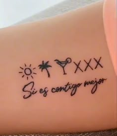 a tattoo with words and symbols on it