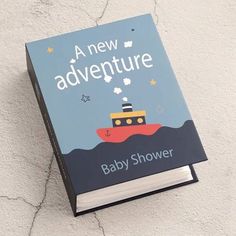 a book with an image of a boat in the ocean on it's cover