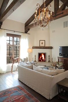 a living room with a fire place in it