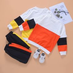 Pattern: color blocking Color: orange, yellow Height: 90CM, 100cm, 110cm, 120cm, 130cm Sleeves: long sleeves Thickness: normal Fabric: Cotton Gender: neutral, boy, girl Listing: Winter 2021 Season: spring and Autumn White Cotton Sets With Patchwork, White Long Sleeve Patchwork Sets, White Long Sleeve Color Block Sets, Playful Multicolor Sets For Fall, Multicolor Long Sleeve Sets For Fall, Multicolor Cotton Sets With Color Block, Casual Yellow Sets With Long Sleeves, Yellow Long Sleeve Winter Sets, Casual Yellow Long Sleeve Sets