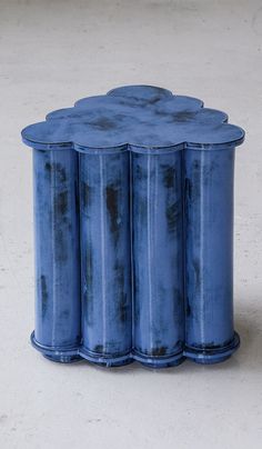 three blue vases sitting on top of each other