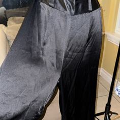 Elegant Satin Black Wide Leg Pants. Sleek And Stylish. Perfect For Any Occasion. Solid Satin Pants For Night Out, Solid Color Satin Pants For Night Out, Black Satin Wide-leg Pants, High-waisted Satin Pants For Night Out, Satin High-waisted Pants For Night Out, Sleek Wide-leg Pantsuit For Party, High-waist Satin Bottoms For Date Night, Fitted Satin Bottoms With Straight Leg, Sleek Wide Leg Pantsuit For Party